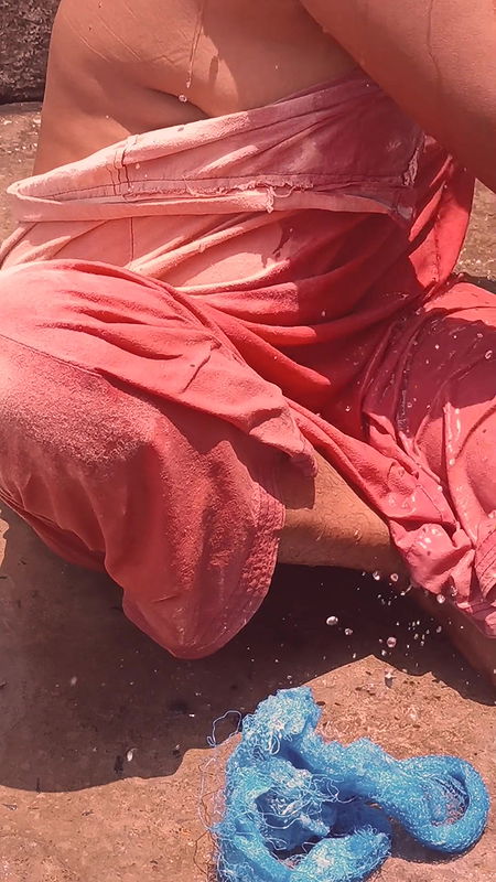 Sima bhabhi bathing outdoor and showing sexy boobs