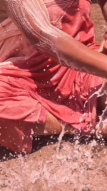 Sima bhabhi bathing outdoor and showing sexy boobs