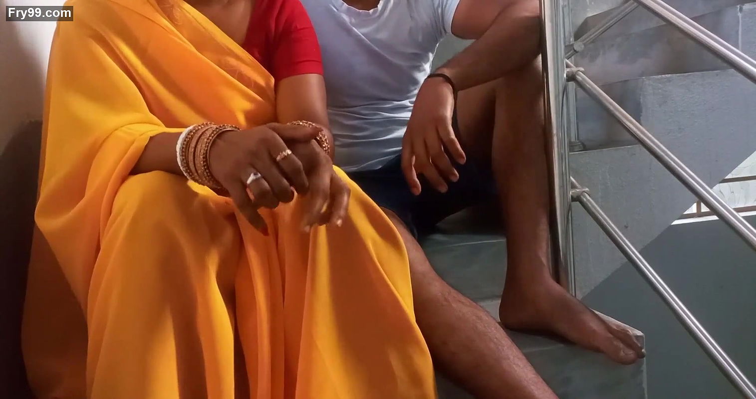 Roshni Bhabhi standing on the stairs