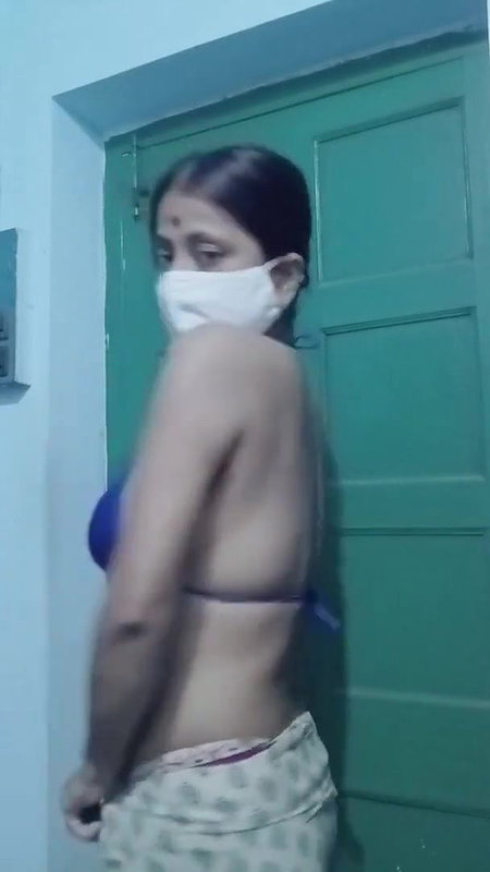 Saree without a bra and a blouse.