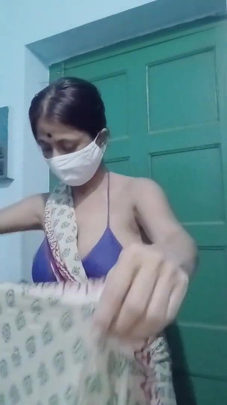 Saree without a bra and a blouse.