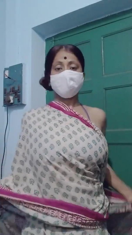 Saree without a bra and a blouse.