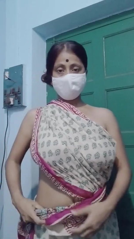Saree without a bra and a blouse.