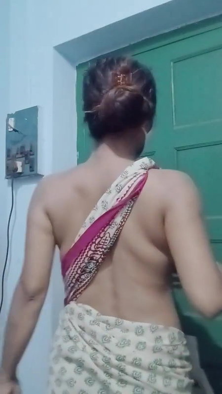 Saree without a bra and a blouse.