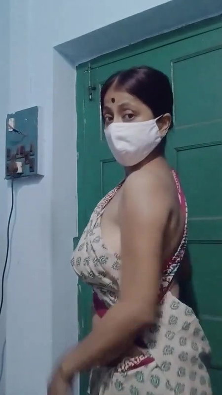 Saree without a bra and a blouse.