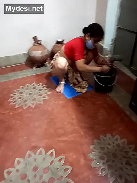 Sexy Maid cleaning floor and showing her ass