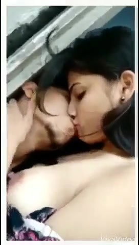 Lover smooching and boobs sucking