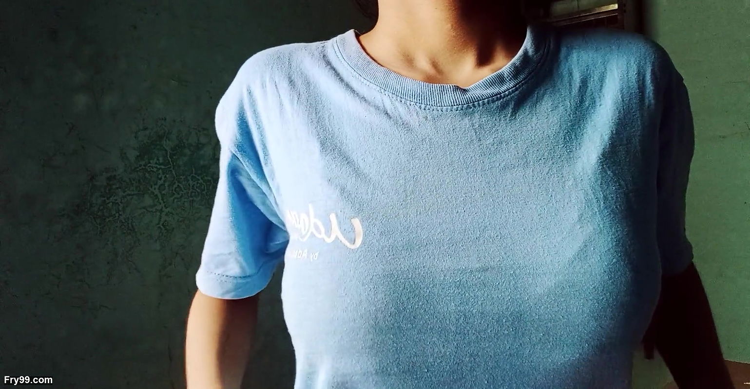 Lonely girl looking at her tits