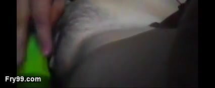 The hot girl took off all the clothes from her body and got naked and spread her legs and tried to insert the thick cucumber int