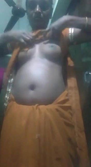 Village Bhabhi shows her boobs and pussy