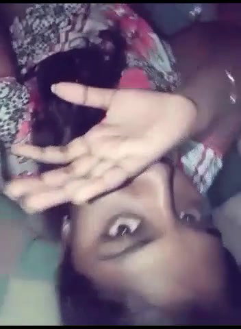 Showing her wet pussy