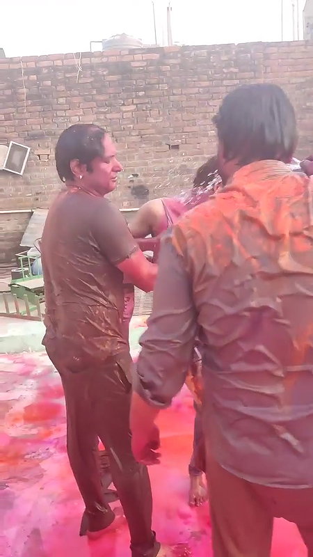 3 Guys pressing boobs of a desi girl during holi