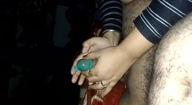 Applying condom