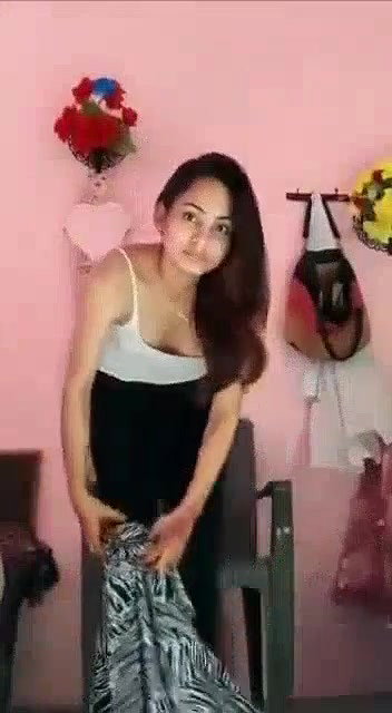 Young college girl undressing