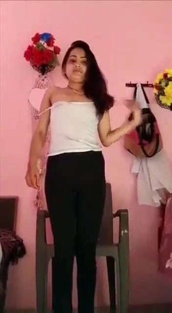 Young college girl undressing