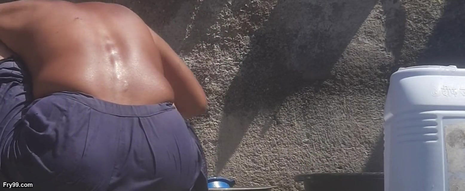 Beautiful sister-in-law in the field, who is roaming in the forest and dropping it and bathing outside in the open bathroom in the field