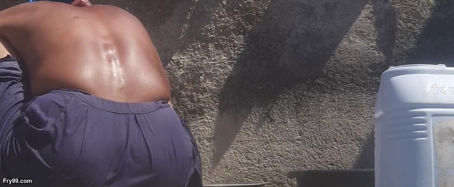 Beautiful sister-in-law in the field, who is roaming in the forest and dropping it and bathing outside in the open bathroom in the field