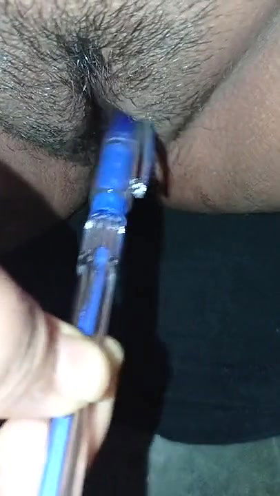 Horny Indian girl masturbating with a pen