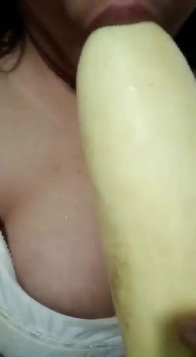 Horny girl sucking cucumber