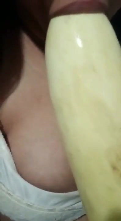 Horny girl sucking cucumber