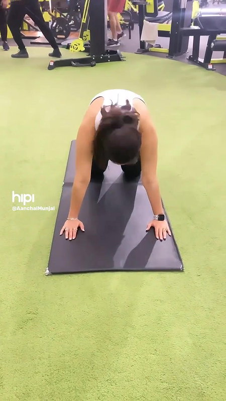 Aanchal munjal hot Cleavage n Boob show while doing yoga