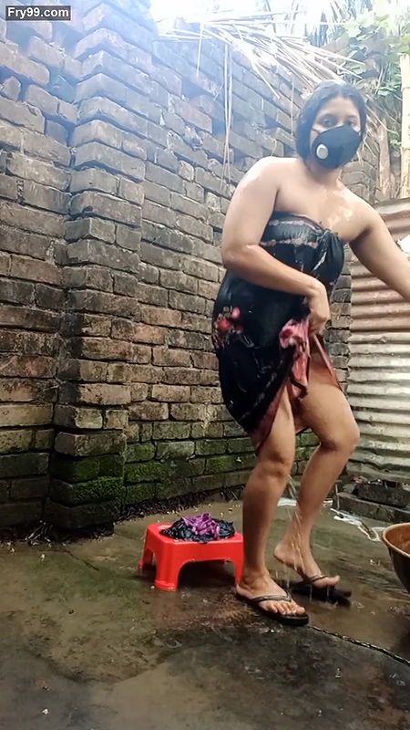 Shower scene of Bangladeshi village girl akhi looking beautiful with sexy dress. Teen hot girl is bathing in the bathroo