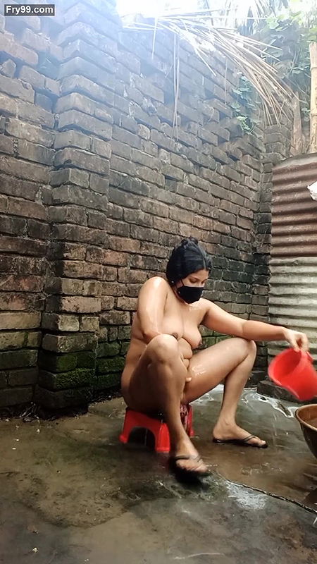 Shower scene of Bangladeshi village girl akhi looking beautiful with sexy dress. Teen hot girl is bathing in the bathroo