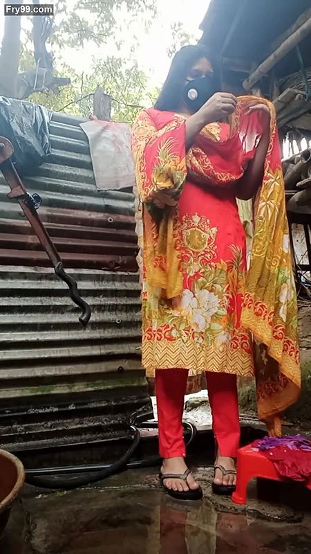 Shower scene of Bangladeshi village girl Akhi looking beautiful with sexy dress