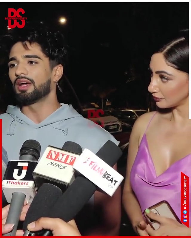 intentionally lower her dress and shows her big and oily cleavage,,