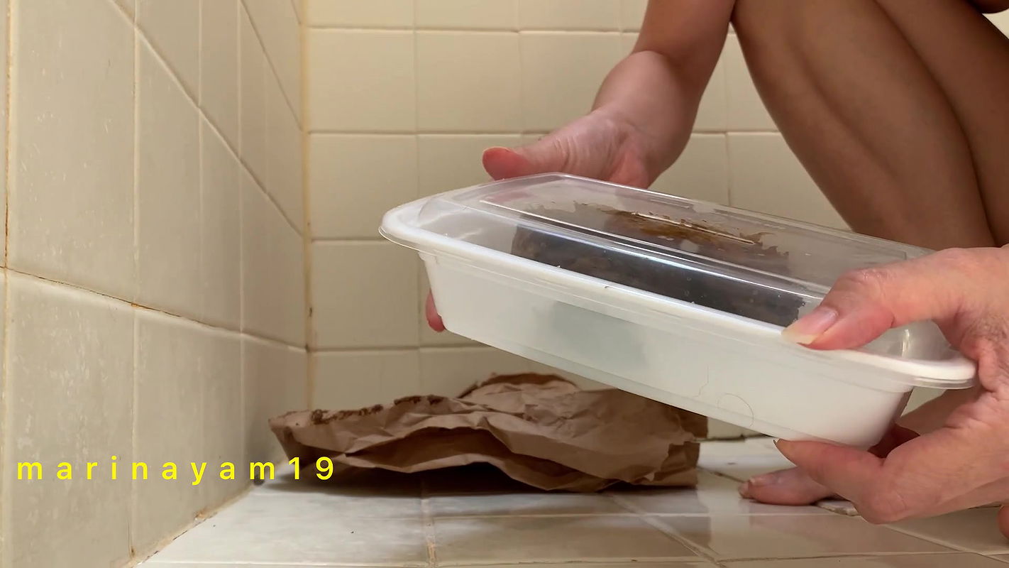 Marinayam19 Shit on paper and transferred to container