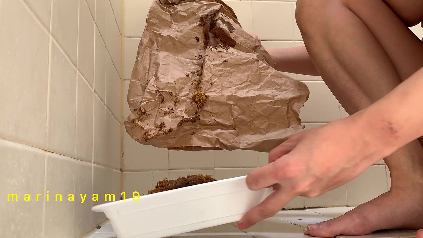 Marinayam19 Shit on paper and transferred to container