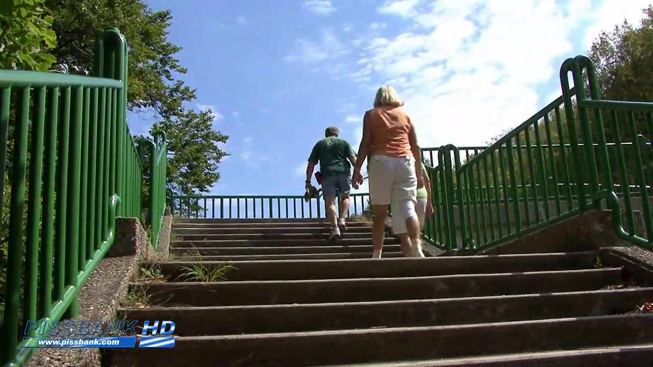 ture brunette caught peeing stairs