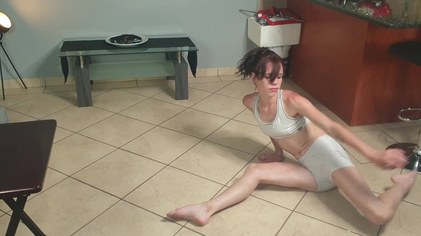 exible petite girl pissing through white pants into her mouth