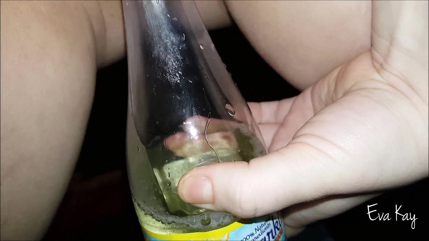 a kay Peeing in a bottle