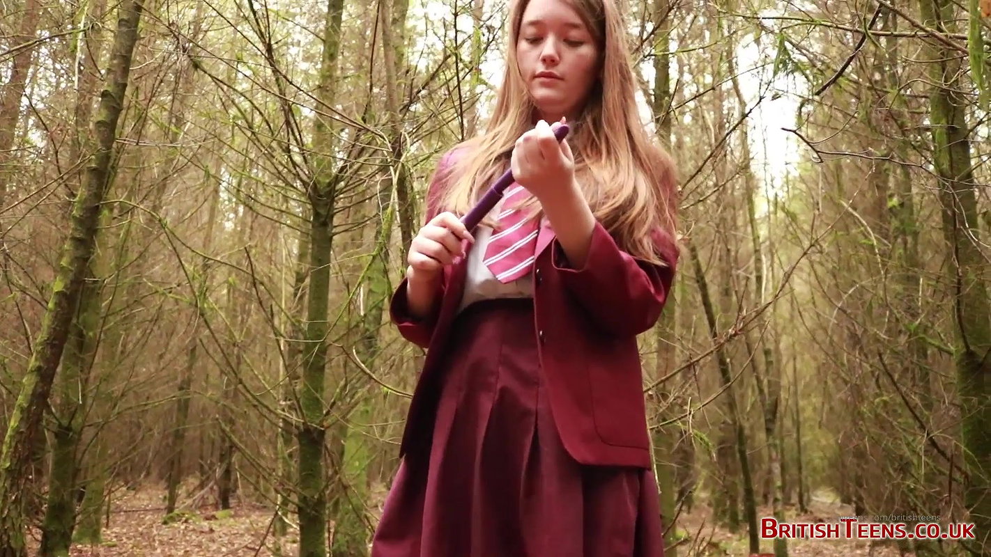 she is walking through the woods and pees with her