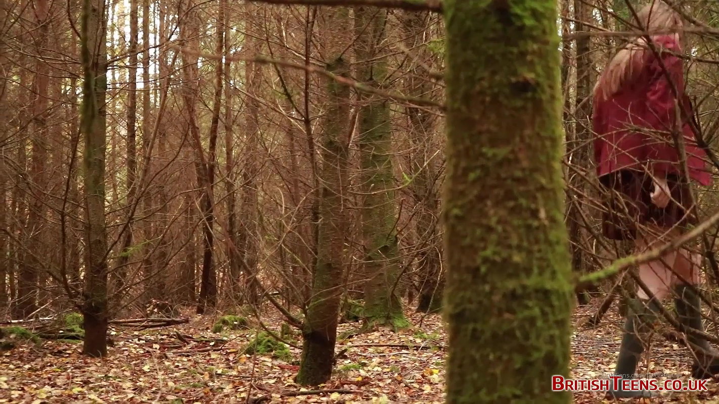 she is walking through the woods and pees with her