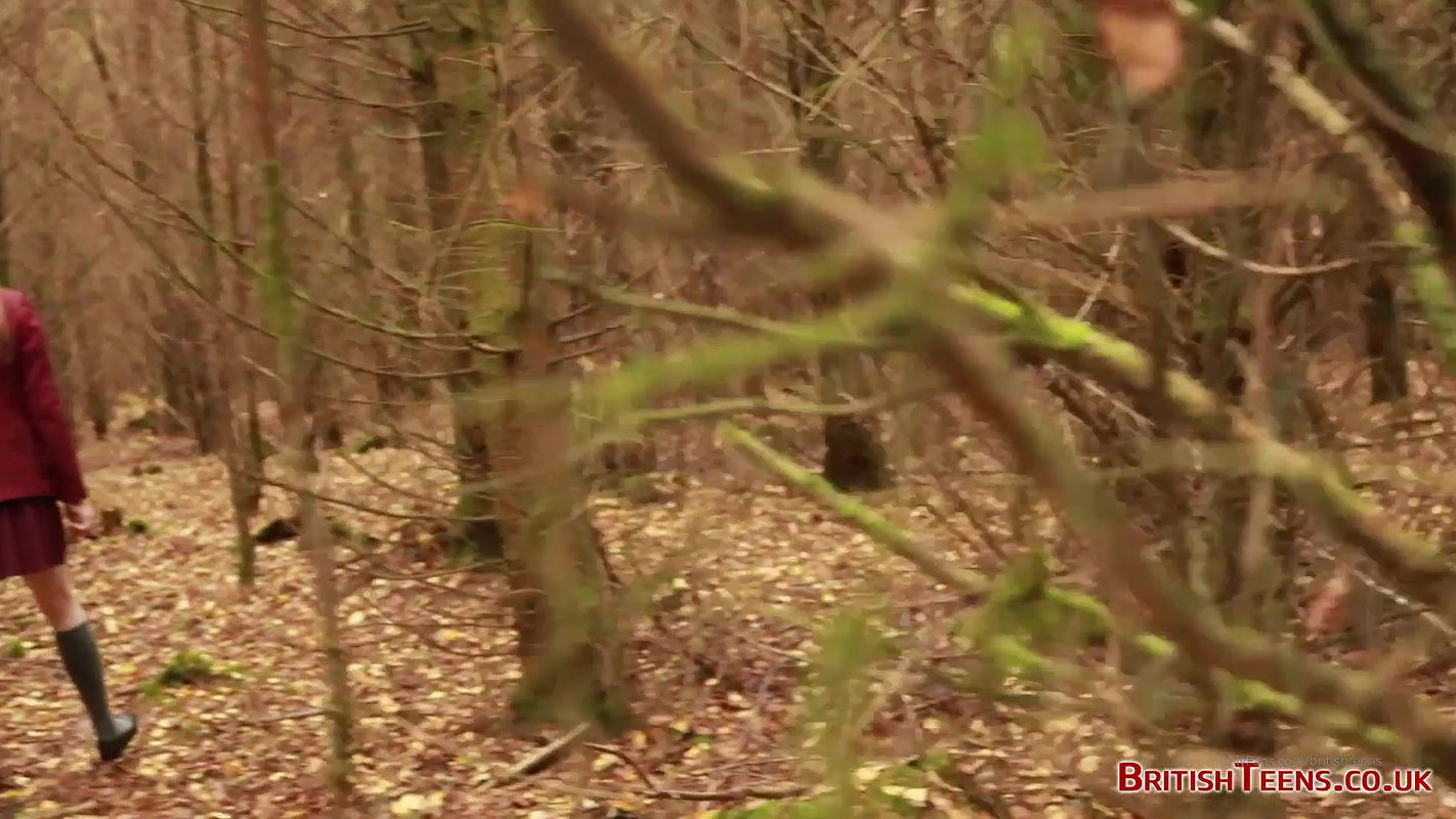 she is walking through the woods and pees with her