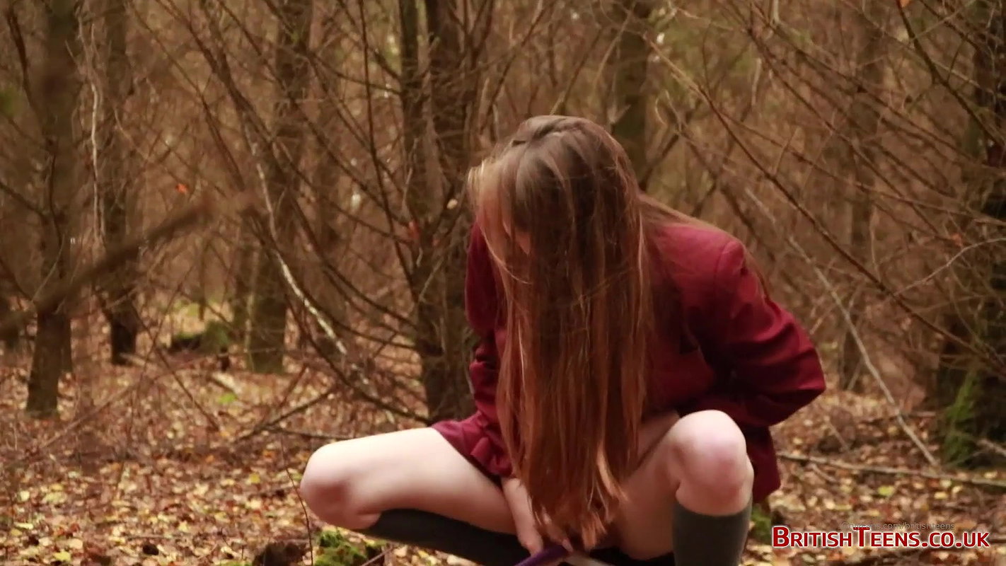 she is walking through the woods and pees with her