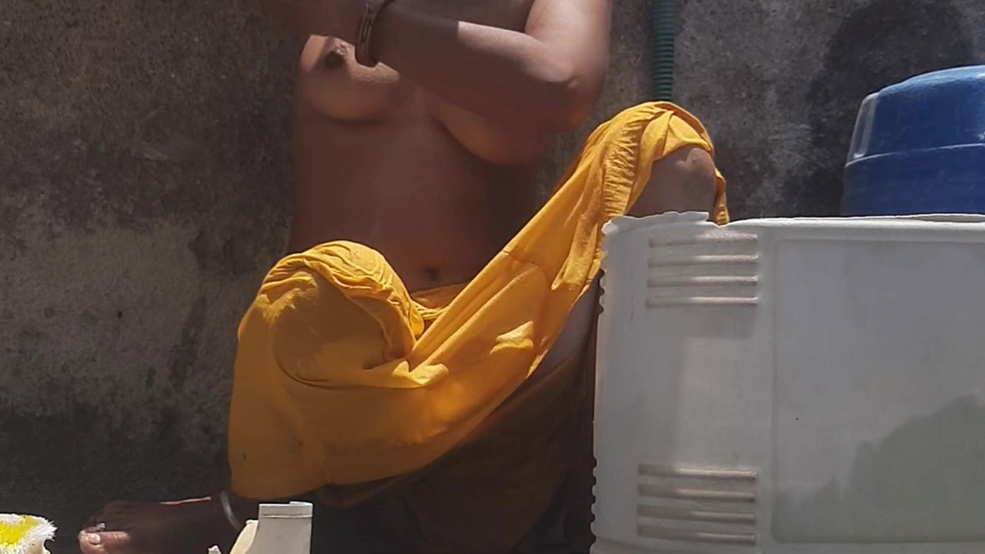 Desi stepsister is taking a bath in the open bathroom, undressing and showing beautiful head body, stepbrother is seen bathing stepbrother in the open bathroom