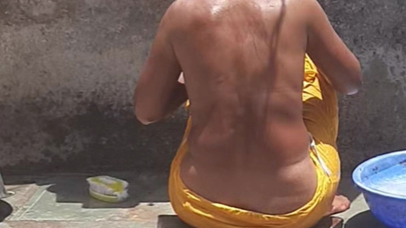 Desi stepsister is taking a bath in the open bathroom, undressing and showing beautiful head body, stepbrother is seen bathing stepbrother in the open bathroom