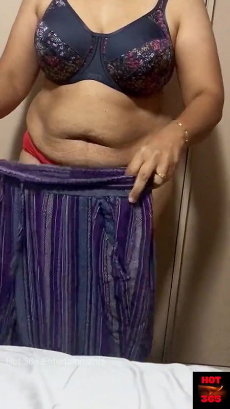 Indian wife changing the clothes