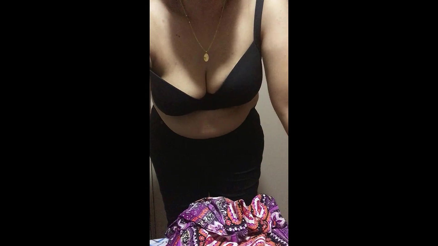 Beautiful Busty Wife changing the dress and exposes her sexy deep cleavage