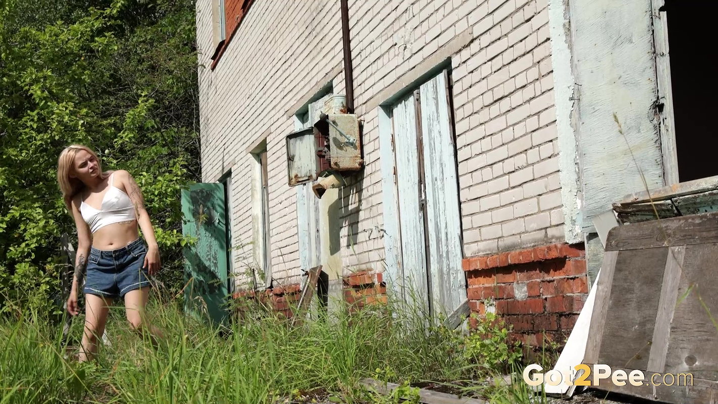 Blonde Babe Lina Cute Squats In A Window To Pee Got2pee