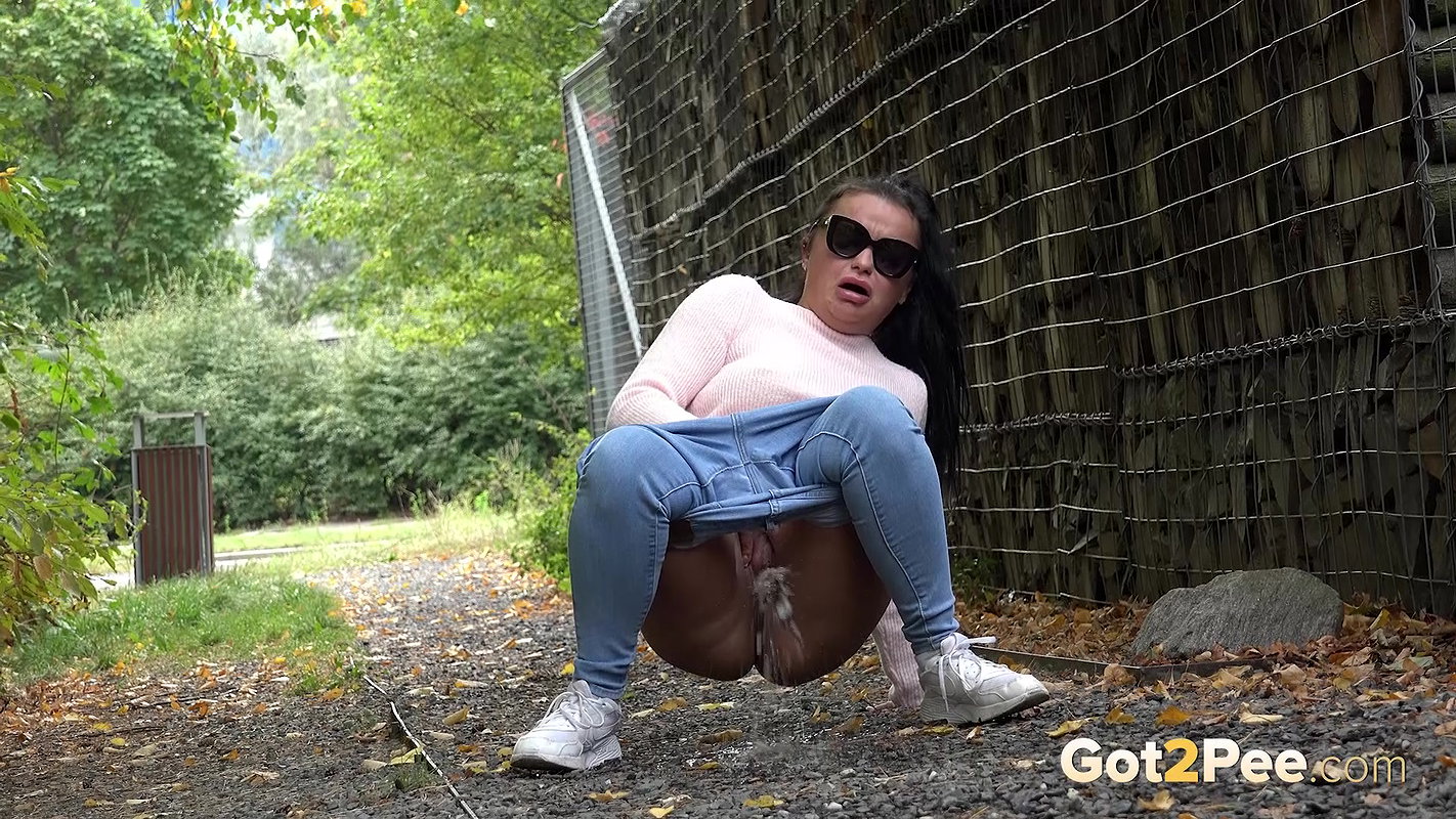 Dark Haired Babe Dafne Relieves Herself Outside Got2pee