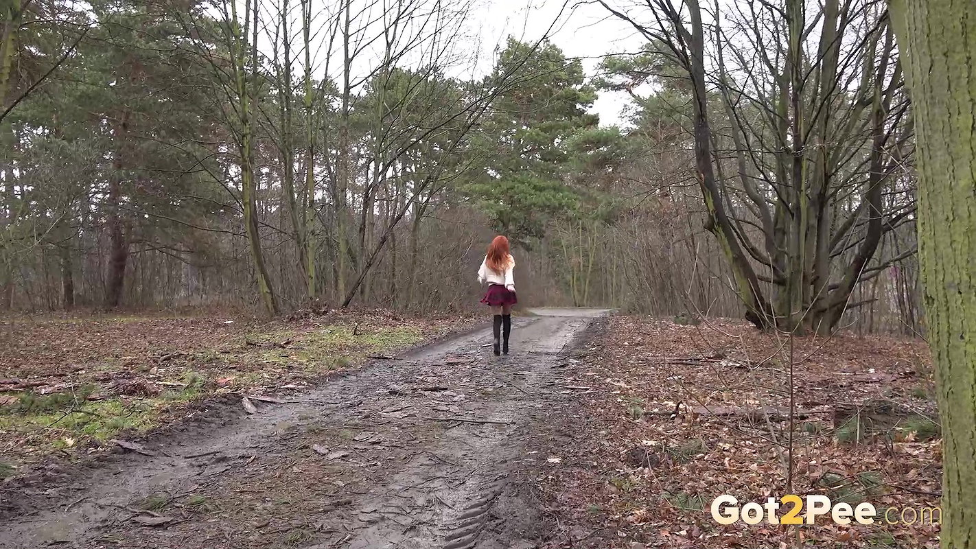 Hot Redhead Katy Squats To Pee On Muddy Track Got2pee