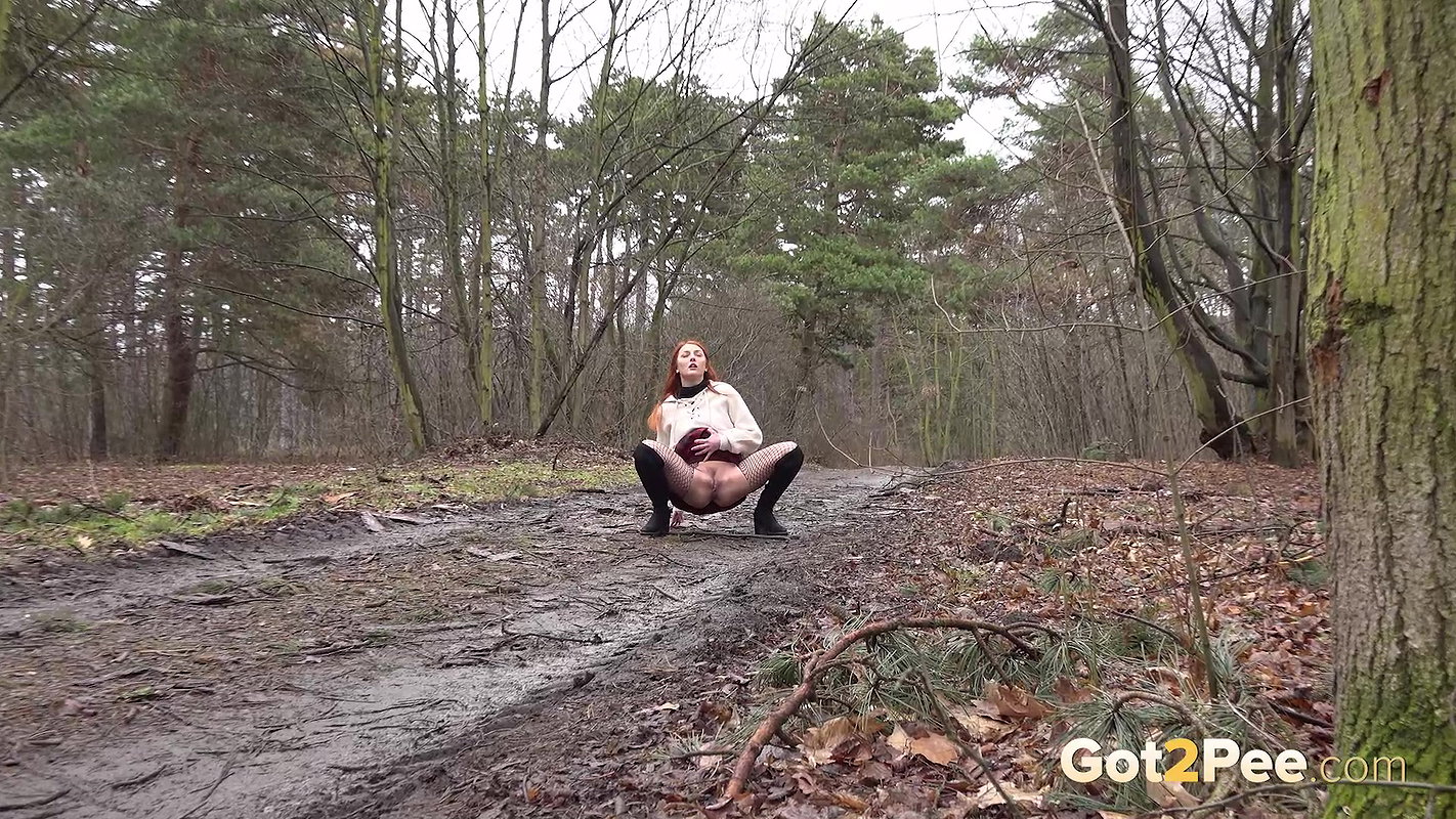 Hot Redhead Katy Squats To Pee On Muddy Track Got2pee