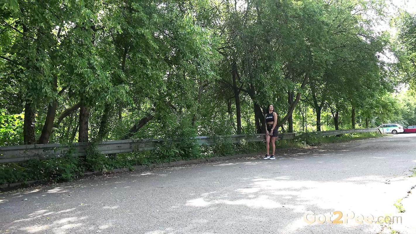 Maddi Black Squats And Pees Over The Road Got2pee