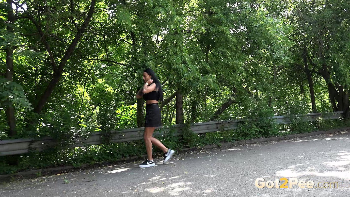 Maddi Black Squats And Pees Over The Road Got2pee