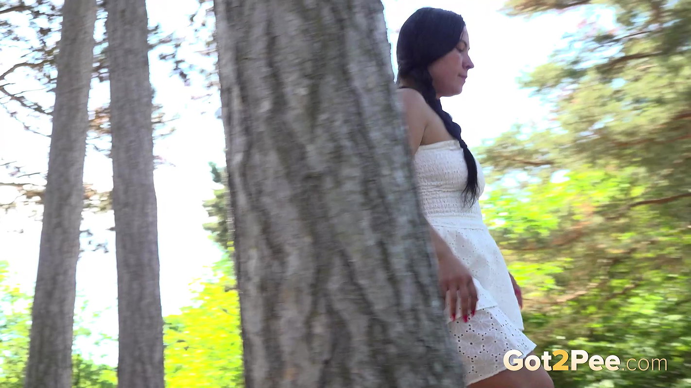 Peeing brunette in the forest Got2Pee