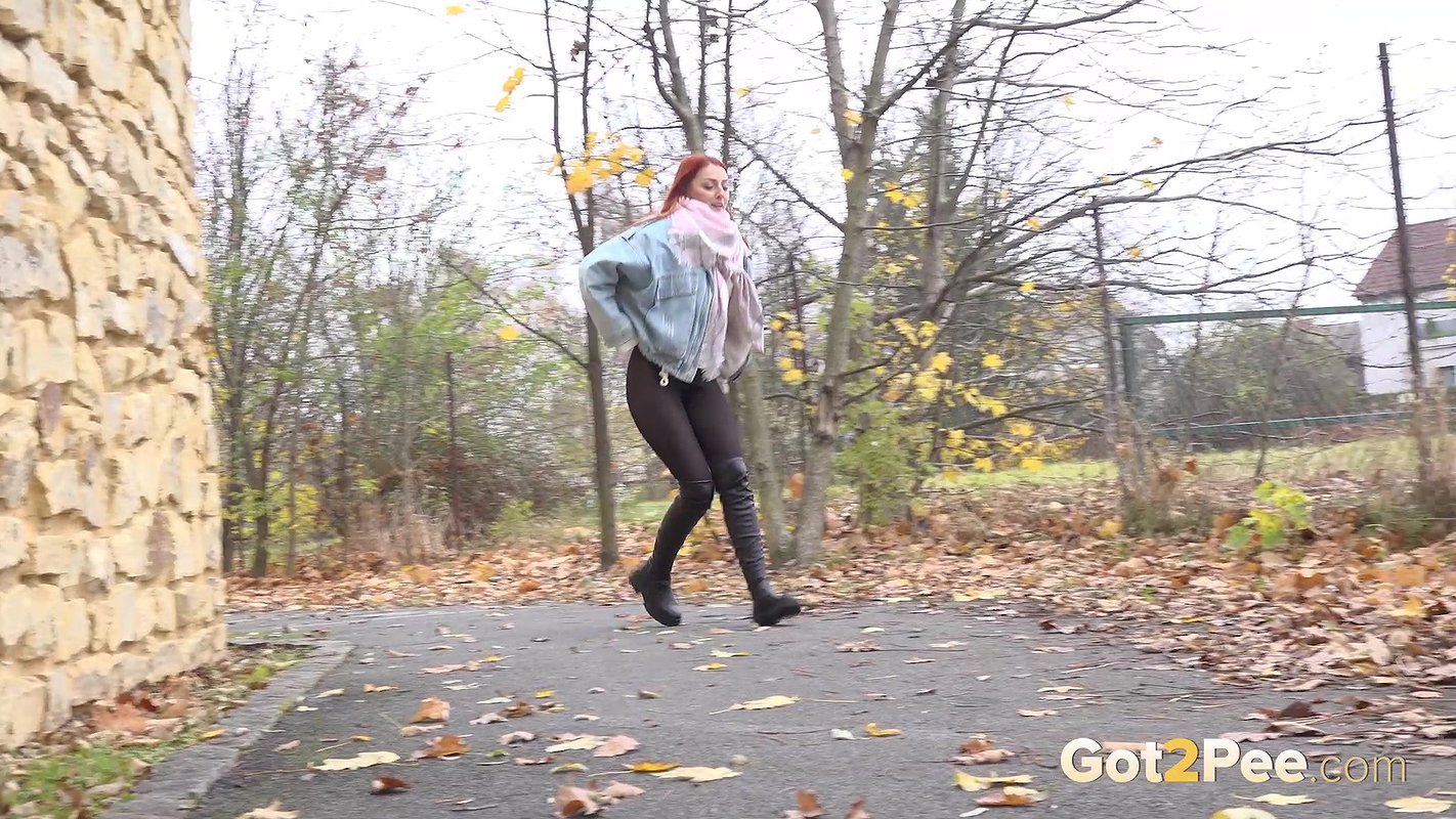 Redhead Babe Relieves Herself In Public Got2pee